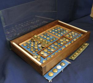 Collection of 106 Nautical Buttons with Case and Stand.